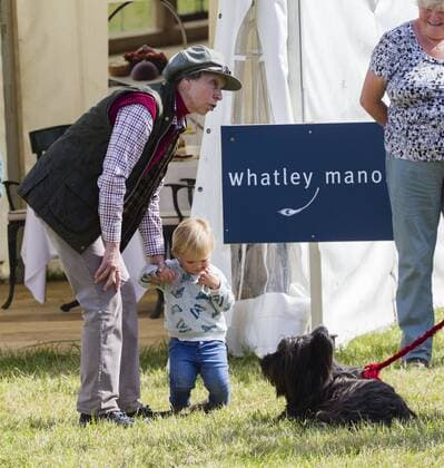 . 12 09 2015. Minchinhampton, United Kingdom. Whatley Manor International Horse Trials. Gatcombe Park. Princess Anne looks after her grand-daughter Mia .  xi-Imagesx IIM-11002-0010