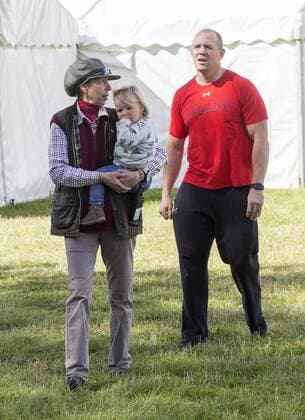 . 12 09 2015. Minchinhampton, United Kingdom. Whatley Manor International Horse Trials. Gatcombe Park. Princess Anne looks after her grand-daughter Mia with Mike Tindall.  xi-Imagesx IIM-11002-0014