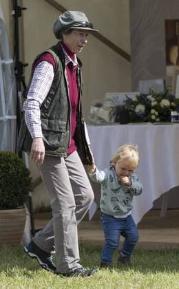 . 12 09 2015. Minchinhampton, United Kingdom. Whatley Manor International Horse Trials. Gatcombe Park. Princess Anne looks after her grand-daughter Mia .  xi-Imagesx IIM-11002-0028