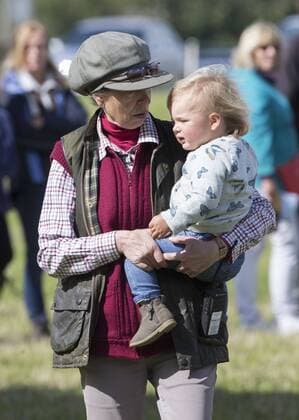 . 12 09 2015. Minchinhampton, United Kingdom. Whatley Manor International Horse Trials. Gatcombe Park. Princess Anne looks after her grand-daughter Mia .  xi-Imagesx IIM-11002-0030