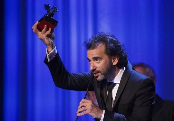 (150912) -- VENICE, Sept. 12, 2015 -- Argentinian director Pablo Trapero gives a speech after winning the Silver Lion award for Best Director for his movie El Clan , during the award ceremony at the 72nd Venice Film Festival, at the Lido of Venice, Italy, Sept. 12, 2015. ) ITALY-VENICE-FILM-FESTIVAL-72ND-AWARD-SILVER LION JinxYu 