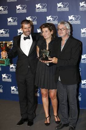 (150912) -- VENICE, Sept. 12, 2015 -- The producer Matthieu Tarot (L) and director Christian Vincent (R) pose with the Best Screenplay Award and the Coppa Volpi for Best Actor of the actor Fabrice Luchini for the movie L Hermine , during the award winners photocall during the 72nd Venice Film Festival, at the Lido of Venice, Italy, Sept. 12, 2015. ) ITALY-VENICE-FILM-FESTIVAL-72ND-AWARD-BEST SCREENPLAY YexPingfan 