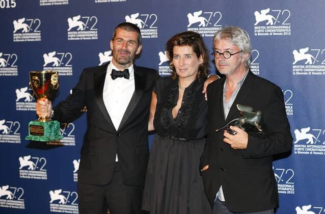 (150912) -- VENICE, Sept. 12, 2015 -- The producer Matthieu Tarot (L) and director Christian Vincent (R) pose with the Best Screenplay Award and the Coppa Volpi for Best Actor of the actor Fabrice Luchini for the movie L Hermine , during the award winners photocall during the 72nd Venice Film Festival, at the Lido of Venice, Italy, Sept. 12, 2015. ) ITALY-VENICE-FILM-FESTIVAL-72ND-AWARD-BEST SCREENPLAY YexPingfan 