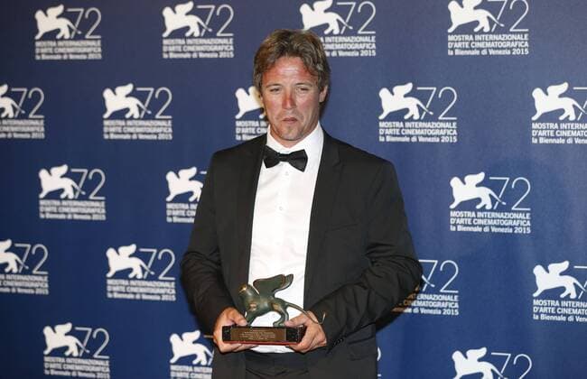(150912) -- VENICE, Sept. 12, 2015 -- Actor Dominique Leborne poses with the Special Orizzonti Award for Best Actor for the movie Tempete , as he attends the award winners photocall during the 72nd Venice Film Festival, at the Lido of Venice, Italy, Sept. 12, 2015. ) ITALY-VENICE-FILM-FESTIVAL-72ND-AWARD YexPingfan 
