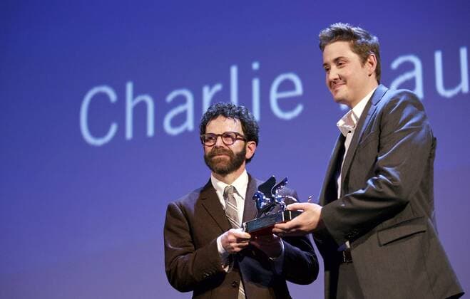 (150912) -- VENICE, Sept. 12, 2015 -- American directors Charlie Kaufman (L) and Duke Johnson pose with the Grand Jury Prize for their movie Anomalisa , during the award ceremony at the 72nd Venice Film Festival, at the Lido of Venice, Italy, Sept. 12, 2015. ) ITALY-VENICE-FILM-FESTIVAL-72ND-AWARD-GRAND JURY JinxYu 