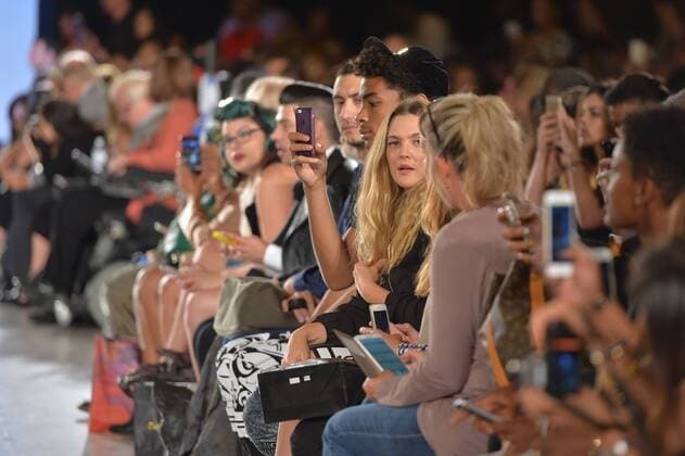 Drew Barrymore sits on the front row at the FTL Moda Fashion Show during New York Fashion Week Spring Summer 2016 Collections in New York City on September 13, 2015.  NYP20150913960 ANDREAxHANKS