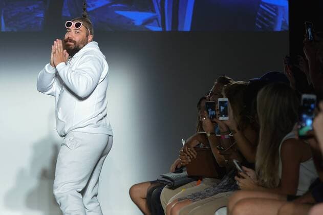 Josh Ostrovsky, aka The Fat Jew , greets the audience just after the finale at a Dad Fashion show held during New York Fashion Week Spring Summer 2016 in New York City on September 16, 2015.  NYP201509162048 ANDREAxHANKS