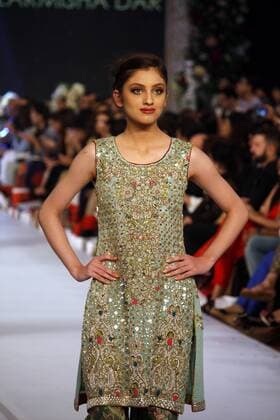 (150917) -- LAHORE, Sept. 17, 2015 -- A model presents a creation by designer Zarmish Dara on the first day of Pakistan Fashion Designing Council (PFDC) bridal fashion week in eastern Pakistan s Lahore, Sept. 16, 2015. ) PAKISTAN-LAHORE-BRIDAL FASHION WEEK JamilxAhmed 