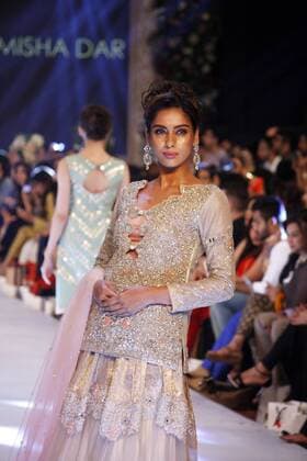 (150917) -- LAHORE, Sept. 17, 2015 -- A model presents a creation by designer Zarmish Dara on the first day of Pakistan Fashion Designing Council (PFDC) bridal fashion week in eastern Pakistan s Lahore, Sept. 16, 2015. ) PAKISTAN-LAHORE-BRIDAL FASHION WEEK JamilxAhmed 