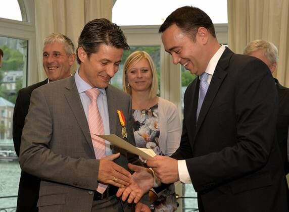 - NAMUR, BELGIUM: Patrice Cani and Walloon Minister of Public Works, Road Safety, Health, Social Affairs, Family Allowances, Equal Chances, Economic Activities and Heritage Maxime Prevot pictured during the award ceremony for the Merite Wallons by the Walloon Government at the Elysette, in Jambes, Namur, Thursday 17 September 2015. ERICxLALMAND 04702129