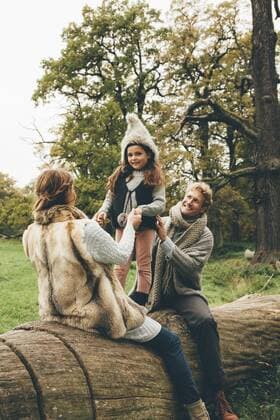 Happy family spending time together in an autumnal park model released Symbolfoto  CHAF000234