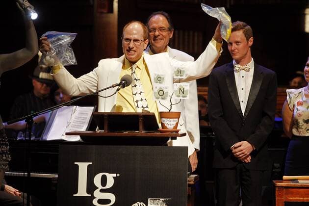 Gregory A. Weiss of UC Irvine, holds up two bags of smashed eggs while demonstrating 2015 Ig Nobel Prize in Chemistry for inventing a chemical recipe to partially un-boil an egg at the awards ceremony at Harvard University in Cambridge, Massachusetts on September 17, 2015. The prizes which are awarded by the Annals of Improbable Research are intended to celebrate the unusual, honor the imaginative and spur people s interest in science, medicine, and technology.  BOS2015091702 MATTHEWxHEALEY
