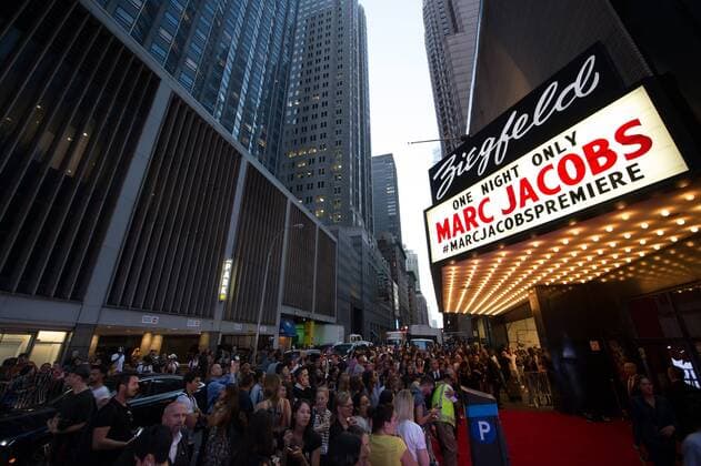 Guests wait outside at The Ziegfeld Theater just before Marc Jacobs Runway Collection for Spring Summer 2016 is presented during New York Fashion Week in New York City on September 17, 2015.  NYP201509172111 ANDREAxHANKS