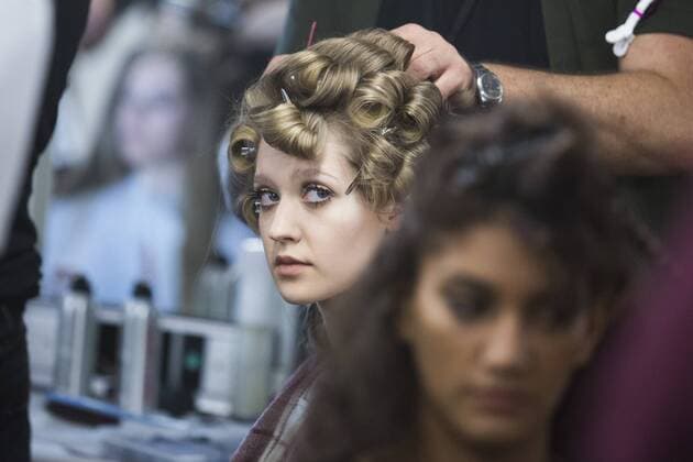 London, UK. 18 09 2015. Models get ready in make-up backstage for the fashion show. DAKS fashion show during London Fashion Week. London Fashion Week, DAKS, London, UK 