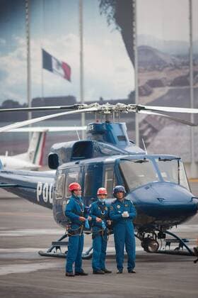 MEXICO CITY, Sept. 18, 2015 -- Emergency workers wait for the arrival of the plane carrying Mexican tourists injured in Egypt, at the Presidential Hangar at Mexico City s International Airport, in Mexico City, capital of Mexico, on Sept. 18, 2015. The six Mexicans who survived the bomb attack perpetrated against a group of tourists in Egypt on Sept. 13, arrived on Friday in Mexico accompanied by their realtives. ) MEXICO-MEXICO CITY-EGYPT-SECURITY-TRANSFER PEDROxMERA 