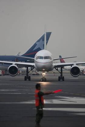 MEXICO CITY, Sept. 18, 2015 -- A plane carrying Mexican tourists injured in Egypt arrives at the Presidential Hangar at Mexico City s International Airport, in Mexico City, capital of Mexico, on Sept. 18, 2015. The six Mexicans who survived the bomb attack perpetrated against a group of tourists in Egypt on Sept. 13, arrived on Friday in Mexico accompanied by their realtives. ) MEXICO-MEXICO CITY-EGYPT-SECURITY-TRANSFER PEDROxMERA 