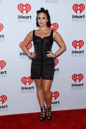 Demi Lovato arrives in the press room for the iHeartRadio Music Festival at the MGM Grand Hotel in Las Vegas, Nevada on September 18, 2015.  LAV20150918030 JAMESxATOA
