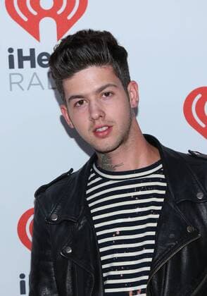 Travis Mills arrives in the press room for the iHeartRadio Music Festival at the MGM Grand Hotel in Las Vegas, Nevada on September 18, 2015.  LAV20150918024 JAMESxATOA