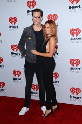 Christopher French and Ashley Tisdale arrives in the press room for the iHeartRadio Music Festival at the MGM Grand Hotel in Las Vegas, Nevada on September 18, 2015.  LAV20150918043 JAMESxATOA