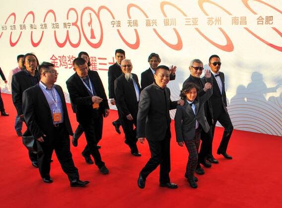 ENTERTAINMENT RED CARPET Preisverleihung Goldene Hahn in Changchun (150919) -- CHANGCHUN, Sept. 19, 2015 -- Cast members of the film The Taking of Tiger Mountain walk on the red carpet before the Award Ceremony of the 24th China Golden Rooster & Hundred Flowers Film Festival in Jilin City, northeast China s Jilin Province, Sept. 19, 2015. )(mcg) CHINA-CHANGCHUN-GOLDEN ROOSTER & HUNDRED FLOWERS FILM FESTIVAL (CN) XuxChang 