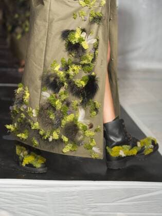 London, UK. 19 09 2015. Runway show of designer James Kelly at Fashion Scout during London Fashion Week. The designs feature moss and fine feathers. London Fashion Week, James Kelly at Fashion Scout, London, UK 