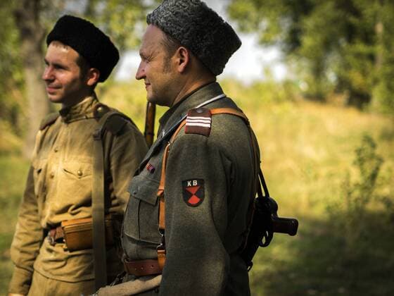 Sept. 19, 2015 - Historical re-enactors in uniform a soldier of the Red Army and the Kuban Cossacks, who fought on the German side in World War II -- In the historical festival Civilization in Kiev, Ukraine have been replicated the history of revolutions, way of life and the atmosphere of centuries since antiquity and the middle of the twentieth century - ZUMAg154