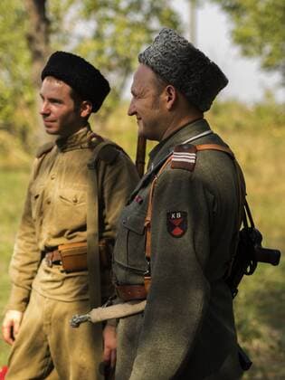 Sept. 19, 2015 - Historical re-enactors in uniform a soldier of the Red Army and the Kuban Cossacks, who fought on the German side in World War II -- In the historical festival Civilization in Kiev, Ukraine have been replicated the history of revolutions, way of life and the atmosphere of centuries since antiquity and the middle of the twentieth century - ZUMAg154