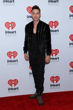Prince Royce arrives for the iHeartRadio Music Festival at the MGM Festival Grounds in Las Vegas, Nevada on September 19, 2015.  LAV20150919083 JAMESxATOA
