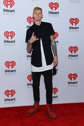 Machine Gun Kelly arrives for the iHeartRadio Music Festival at the MGM Grand in Las Vegas, Nevada on September 19, 2015.  LAV20150919097 JAMESxATOA