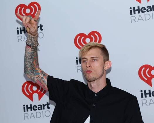 Machine Gun Kelly arrives for the iHeartRadio Music Festival at the MGM Grand in Las Vegas, Nevada on September 19, 2015.  LAV20150919098 JAMESxATOA