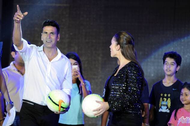 GURGAON, INDIA - SEPTEMBER 20: Bollywood actors Akshay Kumar, Amy Jackson and Manish Paul during the HT GIFA (Hindustan Times Great Indian Football Action) grand opening ceremony event in Tau Devi Lal stadium, on September 20, 2015 in Gurgaon, India. HT GIFA organized to encourage and kickstart an event that promises to be the perfect launch pad for some promising football talent of the Delhi-NCR and Gurgaon region. (Photo by Parveen Kumar Hindustan Times ) Hindustan Times Great Indian Football Action Opening Ceremony In Gurgaon