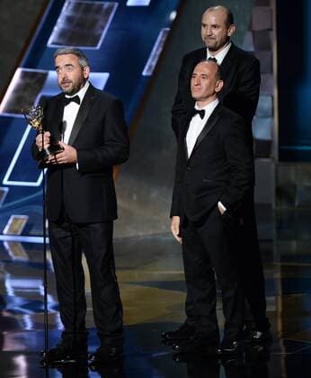 (L-R) Writers Simon Blackwell, Tony Roche and Armando Iannucci accept the award for Outstanding Writing for A Comedy Series for VEEP onstage during the 67th Primetime Emmy Awards in the Microsoft Theater in Los Angeles on September 20, 2015.  LAP20150920659 KENxMATSUI