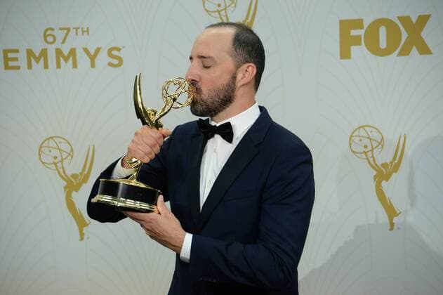 Actor Tony Hale kisses his Emmy for Outstanding Supporting Actor in a Comedy Series at the 67th Primetime Emmy Awards in the Microsoft Theater in Los Angeles on September 20, 2015.  LAP2015092156 JIMxRUYMEN
