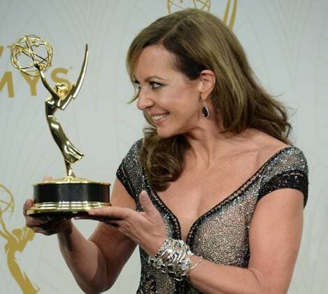 Allison Janney holds her Emmy for Outstanding Supporting Actress in a Comedy Series for her role on Mom at the 67th Primetime Emmy Awards in the Microsoft Theater in Los Angeles on September 20, 2015.  LAP2015092182 JIMxRUYMEN
