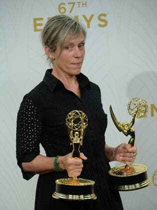 Frances McDormand holds her Emmys for Outstanding Lead Actress in a Limited Series or Movie for her work on Olive Kitteridge at the 67th Primetime Emmy Awards in the Microsoft Theater in Los Angeles on September 20, 2015.  LAP2015092195 JIMxRUYMEN