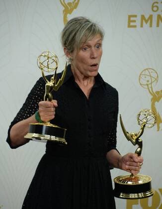 Frances McDormand holds her Emmys for Outstanding Lead Actress in a Limited Series or Movie for her work on Olive Kitteridge at the 67th Primetime Emmy Awards in the Microsoft Theater in Los Angeles on September 20, 2015.  LAP2015092196 JIMxRUYMEN