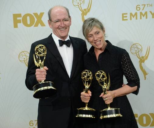 Actor Richard Jenkins (L) and Frances McDormand hold their Emmys for Olive Kitteridge at the 67th Primetime Emmy Awards in the Microsoft Theater in Los Angeles on September 20, 2015.  LAP20150920225 JIMxRUYMEN