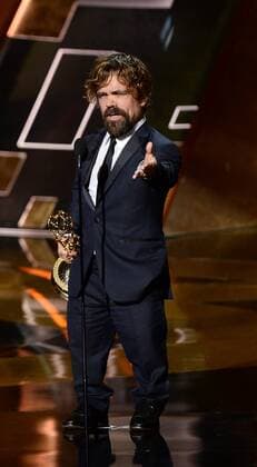 Actor Peter Dinklage accepts the award for Outstanding Supporting Actor in a Drama Series for Game of Thrones onstage during the 67th Primetime Emmy Awards in the Microsoft Theater in Los Angeles on September 20, 2015.  LAP20150920823 KENxMATSUI