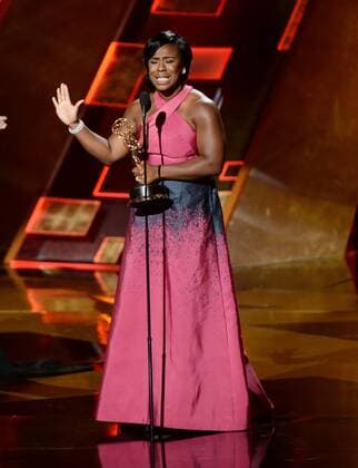 Actress Uzo Aduba accepts the award for Outstanding Supporting Actress in a Drama Series for Orange Is the New Black during the 67th Primetime Emmy Awards in the Microsoft Theater in Los Angeles on September 20, 2015.  LAP20150920831 KENxMATSUI