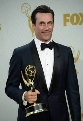 Actor Jon Hamm, winner of Outstanding Lead Actor in a Drama Series for Mad Men, holds his Emmy at the 67th Primetime Emmy Awards in the Microsoft Theater in Los Angeles on September 20, 2015.  LAP20150920278 JIMxRUYMEN