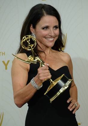 Julia Louis-Dreyfus holds her Emmy Award for outstanding lead actress in a comedy series for her portrayal of Selina Meyer on Veep at the 67th Primetime Emmy Awards in the Microsoft Theater in Los Angeles on September 20, 2015.  LAP20150920169 JIMxRUYMEN