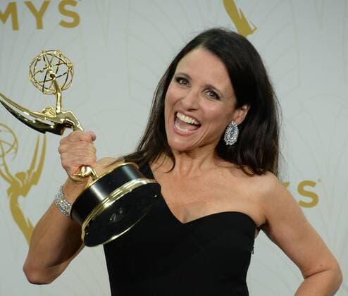 Julia Louis-Dreyfus holds her Emmy Award for outstanding lead actress in a comedy series for her portrayal of Selina Meyer on Veep at the 67th Primetime Emmy Awards in the Microsoft Theater in Los Angeles on September 20, 2015.  LAP20150920172 JIMxRUYMEN