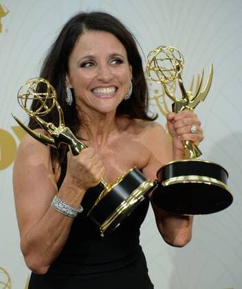 Actress Julia Louis-Dreyfus, holds her Emmy Awards for Outstanding Lead Actress in a Comedy Series for Veep and Outstanding Comedy Series for Veep , at the 67th Primetime Emmy Awards in the Microsoft Theater in Los Angeles on September 20, 2015.  LAP20150920241 JIMxRUYMEN