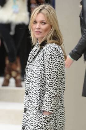 British model Kate Moss attends Burberry Prorsum s Spring Summer 2016 catwalk show in London on September 21, 2015.  LON20150921101 RUNExHELLESTAD
