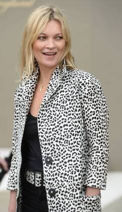 British model Kate Moss attends Burberry Prorsum s Spring Summer 2016 catwalk show in London on September 21, 2015.  LON20150921104 RUNExHELLESTAD