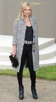 British model Kate Moss attends Burberry Prorsum s Spring Summer 2016 catwalk show in London on September 21, 2015.  LON20150921106 RUNExHELLESTAD