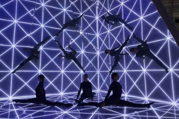 London, UK. 22 09 2015. Three dancers perform at the London Fashion Week runway show of British accessories and handbag designer Anya Hindmarch at Lindley Hall. London Fashion Week, Anya Hindmarch, London, UK 