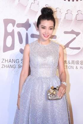 BEIJING, CHINA - SEPTEMBER 22: (CHINA OUT) Actress Li Bingbing poses on the red carpet during the Zhang Shuai 2016 S S Collection & Haute Couture at National Agricultural Exhibition Center on September 22, 2015 in Beijing, China.  CFP473290427