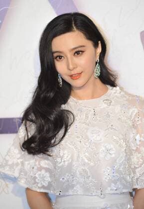 BEIJING, CHINA - SEPTEMBER 22: (CHINA OUT) Actress Fan Bingbing poses on the red carpet during the Zhang Shuai 2016 S S Collection & Haute Couture at National Agricultural Exhibition Center on September 22, 2015 in Beijing, China.  CFP473291337