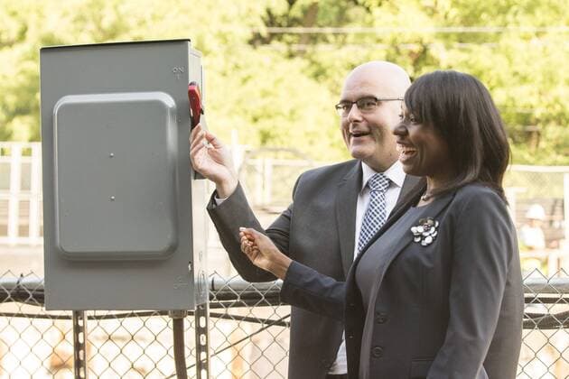 Sept. 24, 2015 - Toronto, ON, Canada - TORONTO, ON - SEPTEMBER 24 - Transportation Minister Steven Del Duca and Mitzie Hunter, Associate Minister of Finance and MPP for Scarborough-Guildwood, turn on the power one of two large boring machines on Eglinton Ave. East, where they will soon begin boring toward Yonge St. The Crosstown is a light rail transit (LRT) line that will run across Eglinton Avenue between Mount Dennis (Weston Road) and Kennedy Station. This 19-kilometre corridor will include a 10-kilometre underground portion, between Keele Street and Laird Drive. September 24, 2015. Toronto Canada  - ZUMAt14_
